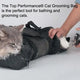Cat grooming bag with a cat inside, being used for grooming.