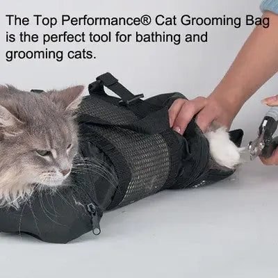 Cat grooming bag with a cat inside, being used for grooming.
