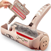 Tan dog edition ChomChom Roller pet hair remover with opened lint chamber full of pet hair.