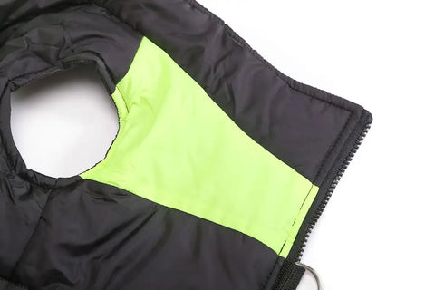 Close-up of a black and green jacket with a zipper