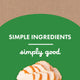 Graphic showing sliced real chicken breast emphasizing simple, natural ingredients used in Buddy Biscuits.