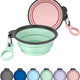 Set of 2 portable collapsible silicone dog bowls in sprout green and pink with carabiner clips