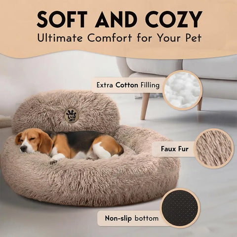 Small dog resting in a plush donut bed highlighting faux fur and non-slip bottom features