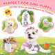 An adorable white fluffy puppy wearing a flower crown, surrounded by lifestyle photos showing her playing with a grey bunny plush, a pink heart toy, and pink dog rope toys.