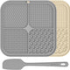 Light grey and beige quad-textured dog anxiety relief lick mats shown with a silicone spatula.
