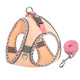 Dog harness and leash set with plaid pattern on white background.