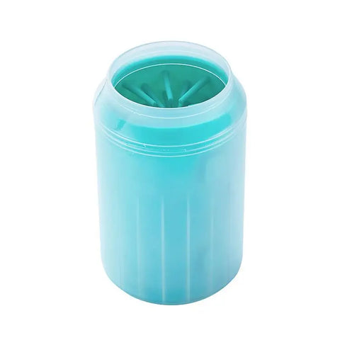 Dog paw being cleaned in cleaning cup with water and bristle action.