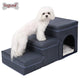 Dog sitting on a pet staircase with a small doghouse attached.