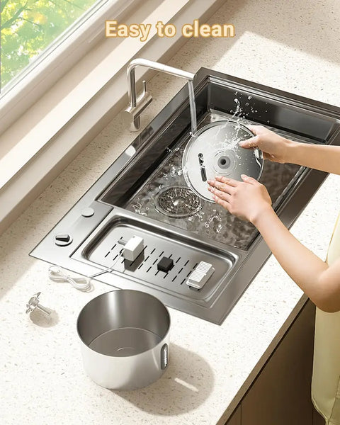 Person washing the stainless steel parts of the pet fountain in a kitchen sink to show easy cleaning.
