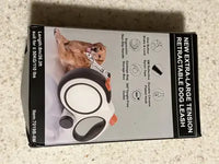 Product packaging review image for the new extra-large tension retractable dog leash, showing specifications for dogs up to 110 lbs.