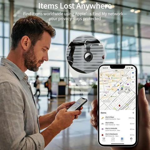 Man using an iPhone to locate a lost bike using a global tracking network.