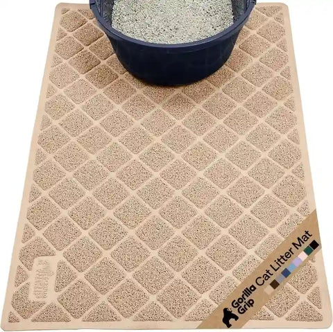 Full top-down view of a beige Gorilla Grip cat litter mat placed under a navy litter box