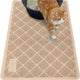 Beige Gorilla Grip cat litter trapping mat positioned under a litter box with a tabby cat