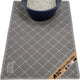 Full top-down view of a grey Gorilla Grip cat litter mat underneath a litter box
