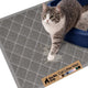 Grey Gorilla Grip cat litter mat capturing litter scatter as a cat steps out of the box