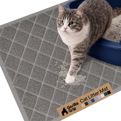 Grey Gorilla Grip cat litter mat capturing litter scatter as a cat steps out of the box