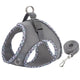 Gray dog harness with patterned straps and matching leash on a white background
