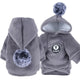 Gray hoodie with pom-poms on white background.