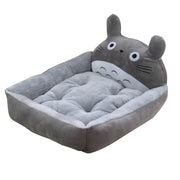 Gray pet bed with a charming cartoon character design on a white background