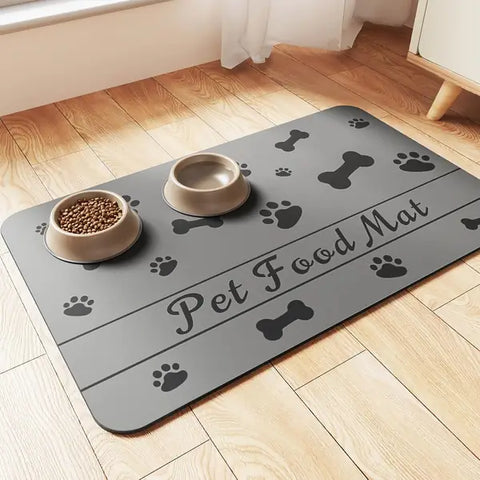 Gray absorbent pet food mat featuring bone and paw print icons with "Pet Food Mat" text.