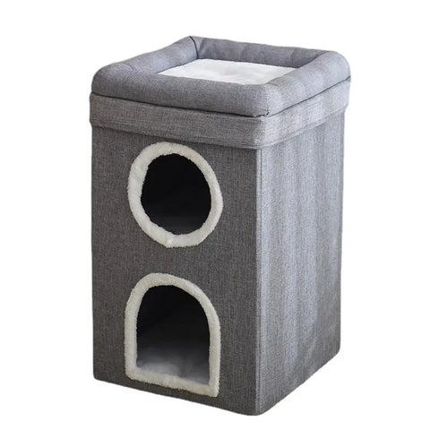 Gray pet playhouse with two round entrances on white background.