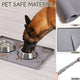 Gray pet safe silicone feeding mat demonstrating its soft, flexible, and durable material with a dog eating.