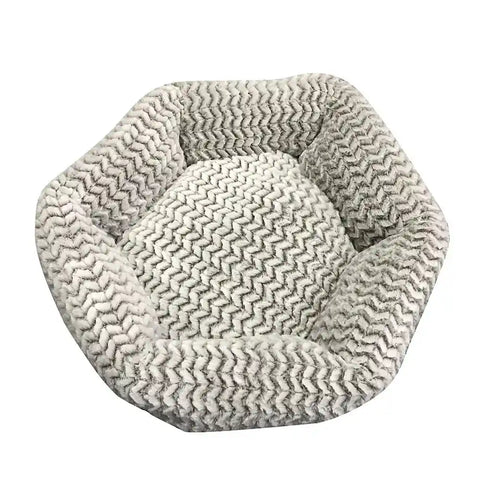 Gray textured pet bed on a white background.