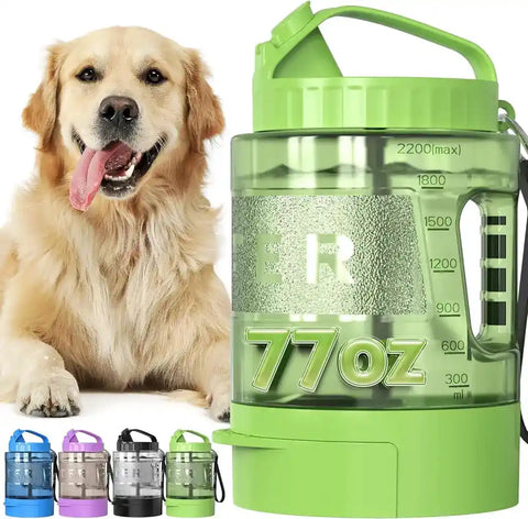 Green 77oz large capacity dog water flask with handle beside a smiling Golden Retriever