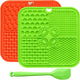 A two piece silicone pet lick mat set in bright green and orange colors with an included green scraping spatula.