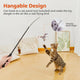 Cat jumping towards a flapping sandpiper bird toy attached to a teaser wand string