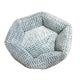 Hexagonal pet bed with a textured pattern on white background.