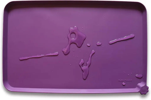 Eggplant deep purple silicone pet bowl feeding mat with raised protective border.