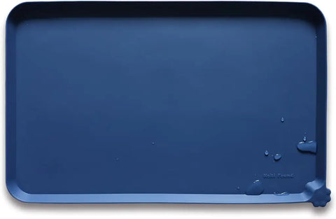 Indigo Ink dark navy blue silicone pet food placemat with raised edges.