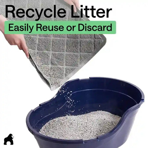 Person bending grey cat litter mat to pour trapped litter back into the blue cat litter box