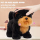 Hand patting the head of an interactive plush dog toy to make it bark