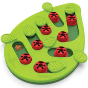 Green leaf-shaped cat puzzle toy featuring ladybug sliding pegs and swivel leaf covers.