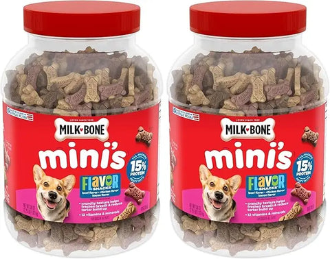 Two large jars of Milk-Bone Minis Flavor Snacks dog treats in beef, chicken, and bacon flavors.