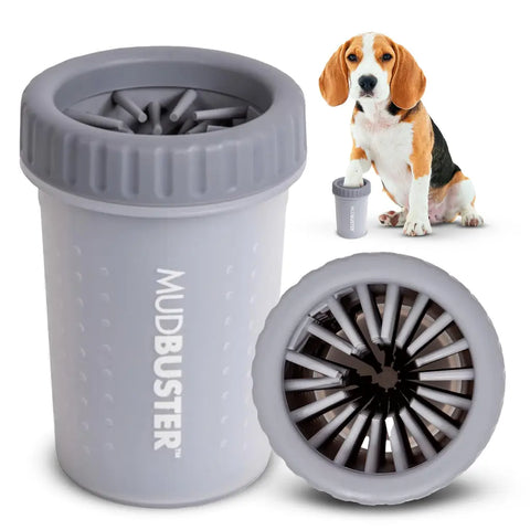 Exploded feature diagram of a gray MudBuster paw cleaner cup showing the removable bristle mat and travel lid