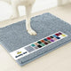 Muddy Mat super absorbent chenille dog door mat in Baby Blue color with dog paw.