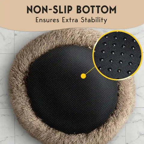 Underside of a plush pet bed showing the non-slip anti-skid rubberized grips