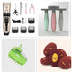 Pakeway pet deshedding brush shown alongside a cordless dog trimmer and grooming accessories.