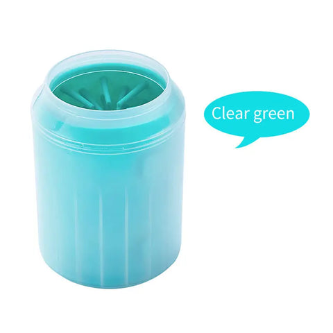 Paw washer cup in use outdoors for cleaning muddy paws before entering home.