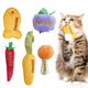 A fluffy domestic longhair cat biting a yellow fish plush toy, shown next to a 5-pack of Pawsible catnip toys including a blueberry, carrot, chili pepper, and drumstick.