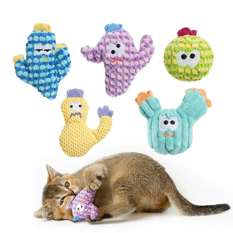  A brown kitten biting a pink textured bubble fleece cactus toy, displayed with a set of 5 colorful, funny-faced textured cactus and ball catnip toys for dental health.