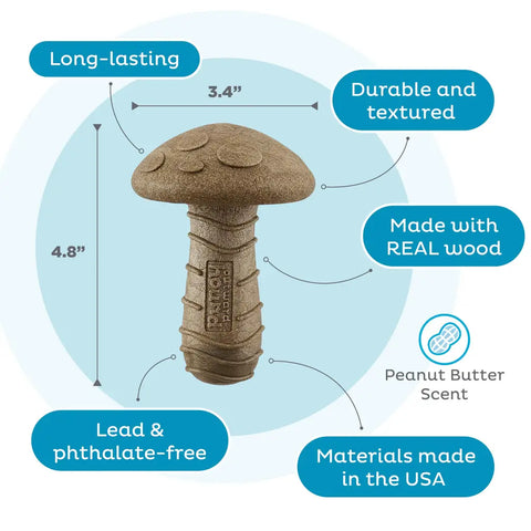 Mushroom-shaped dog chew toy with peanut butter scent, made in the USA with real wood and textured surface.