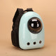 Pet backpack carrier with a transparent dome on a beige background