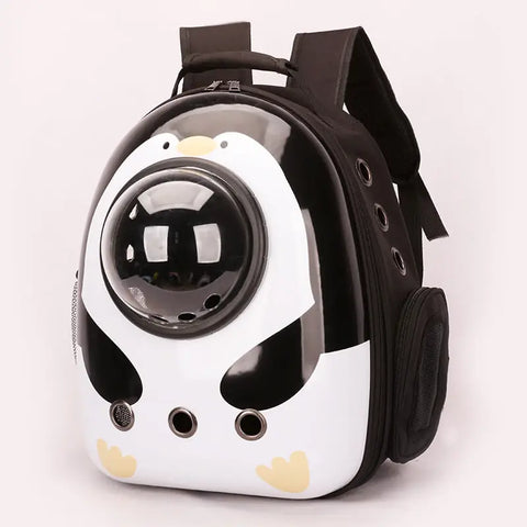 Pet backpack with a design resembling a penguin on white background.