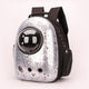 Pet backpack with bubble window design on white background.