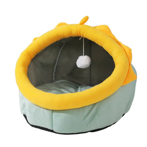 Pet bed with yellow rim and green base on white background.