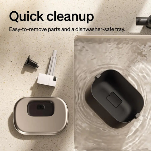 Easy to clean pet water fountain components and dishwasher-safe tray shown in a sink